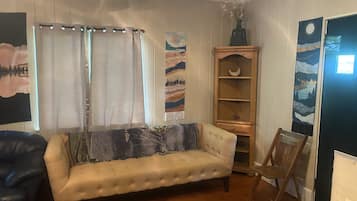 Smart TV, fireplace, table football, books