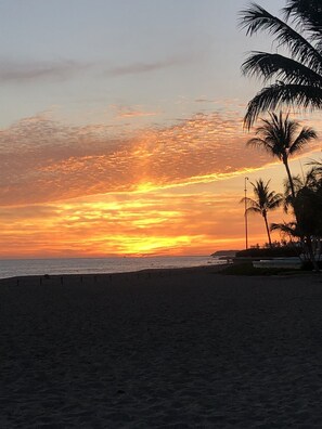On the beach, sun-loungers, beach towels