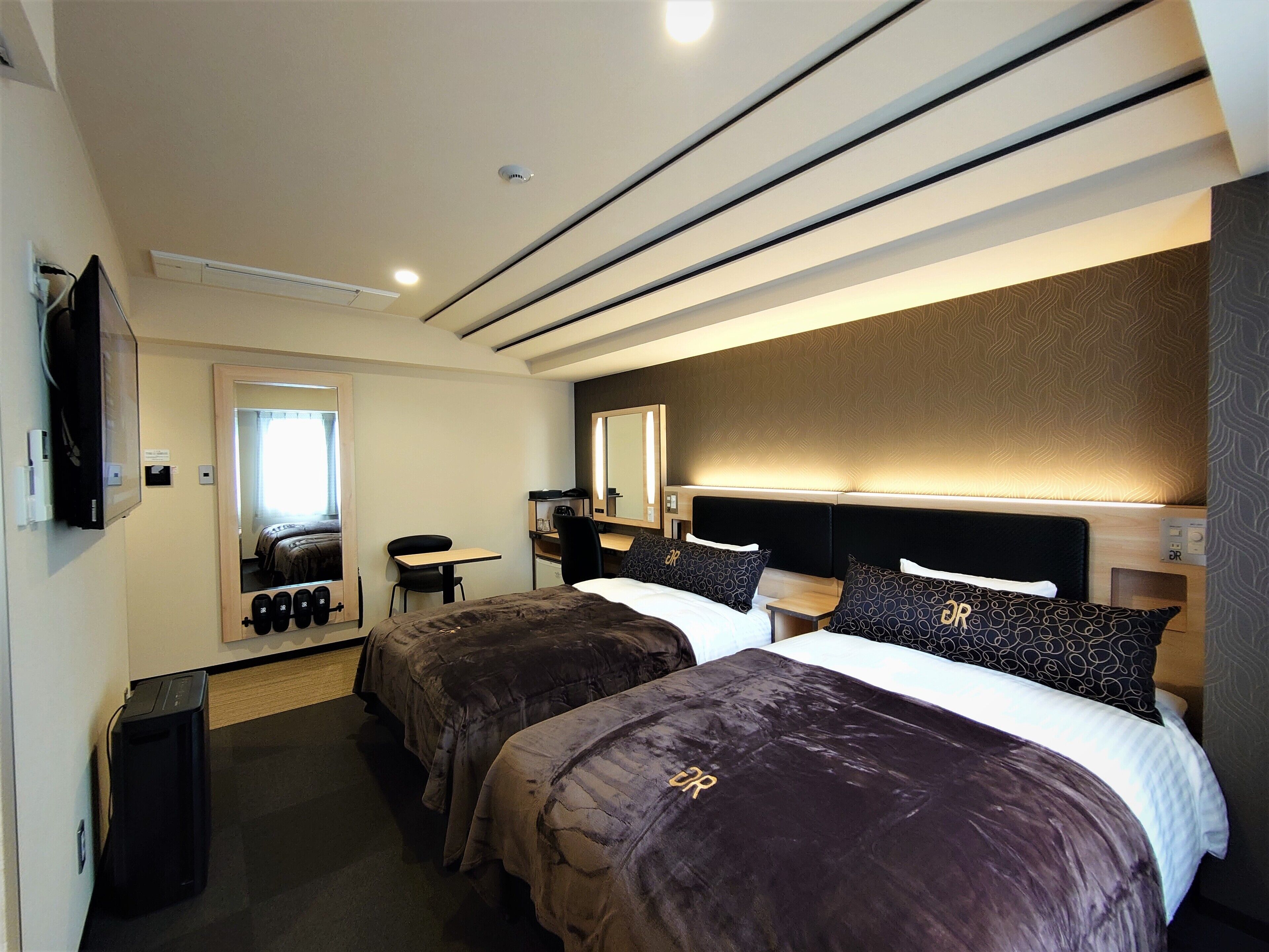 Down duvets, desk, laptop workspace, iron/ironing board