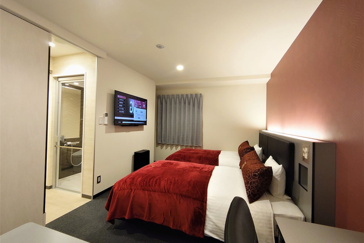 down duvets, desk, laptop workspace, iron/ironing board