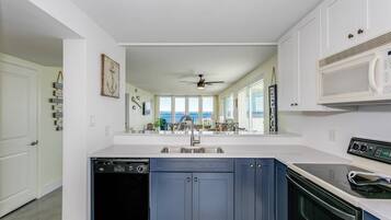 Coffee/tea maker, fridge, microwave, oven
