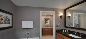 Bathtub, hair dryer, towels, soap