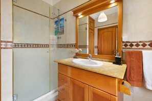 Bathtub, hair dryer, towels