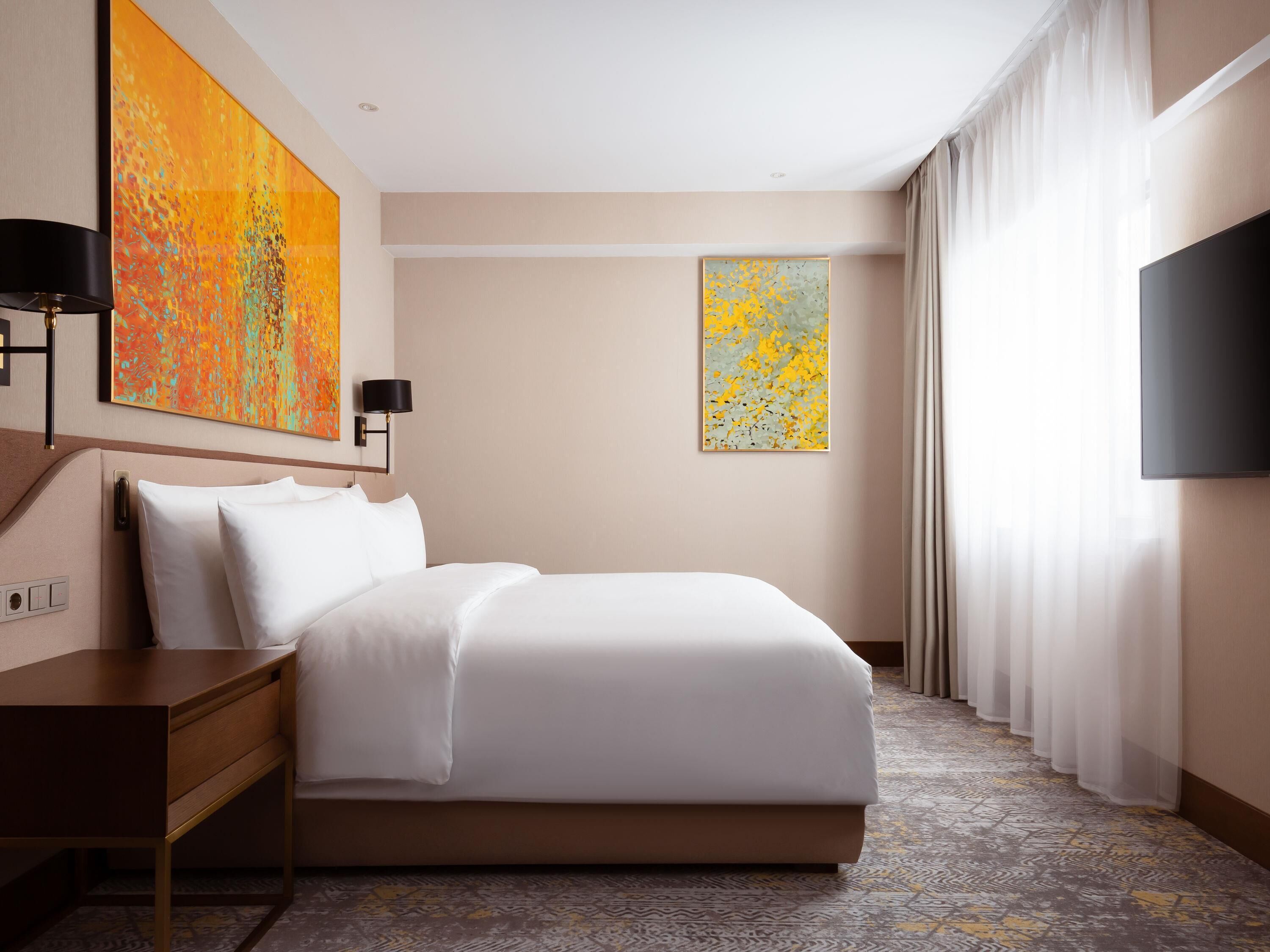 Suite Deluxe, 1 très grand lit | Literie de qualité, minibar, coffre-fort pour ordinateur portable