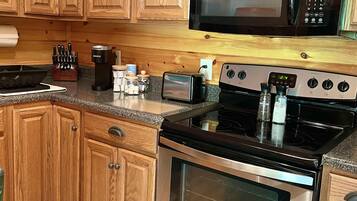 Microwave, coffee/tea maker, cookware/dishes/utensils