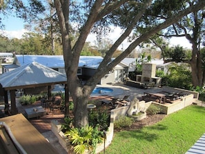 Outdoor dining - Beautiful Oasis on the Creek with Pool; 2 houses and backyard paradise (Satsuma)