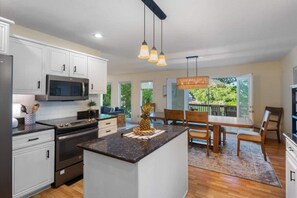 Fridge, microwave, oven, stovetop - The Anchor House — Experience lakeside luxury at a spacious 5-bedroom retreat in Osage Beach. Enjoy breathtaking views, modern comforts, and direct lake access for the perfect Lake of the Ozarks getaway. (Osage Beach)