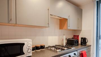 Apartment, 2 Bedrooms, Non Smoking | Private kitchen | Full-size fridge, microwave, oven, coffee/tea maker