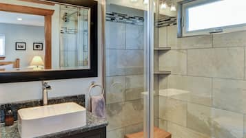 Combined shower/tub, hair dryer, towels, soap