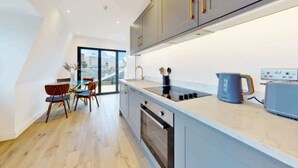 Appartement, 1 lit double | Cuisine privée | Réfrigérateur, micro-ondes, four, plaque de cuisson