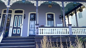 A two-story building with a porch, a mailbox, and a number '819' on the front. - Ocean Views 1 block from Beach 3 blocks from Washington Square  (Cape May)