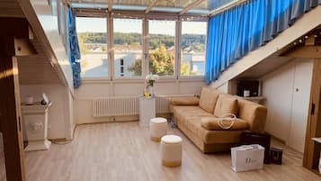 Apartment | Living room | 30-inch TV with digital channels