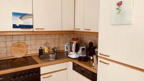 Apartamento | Cozinha privada | Geladeira, fogão, cooktop, lava-louças