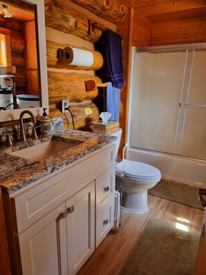 Combined shower/bathtub, hair dryer, towels, soap