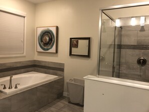 Combined shower/tub, hair dryer, towels, soap