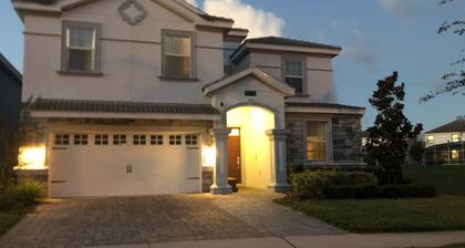 8 bedrooms, 5 bathrooms. Theater Room + Pool/Spa + WiFi