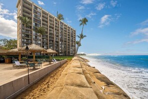 On the beach, sun-loungers, beach towels