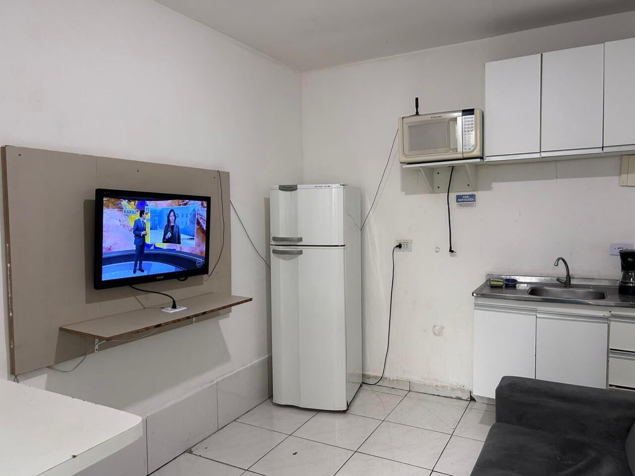 APARTAMENTO 04 - 01 DORMITÓRIO | Living area | LCD TV