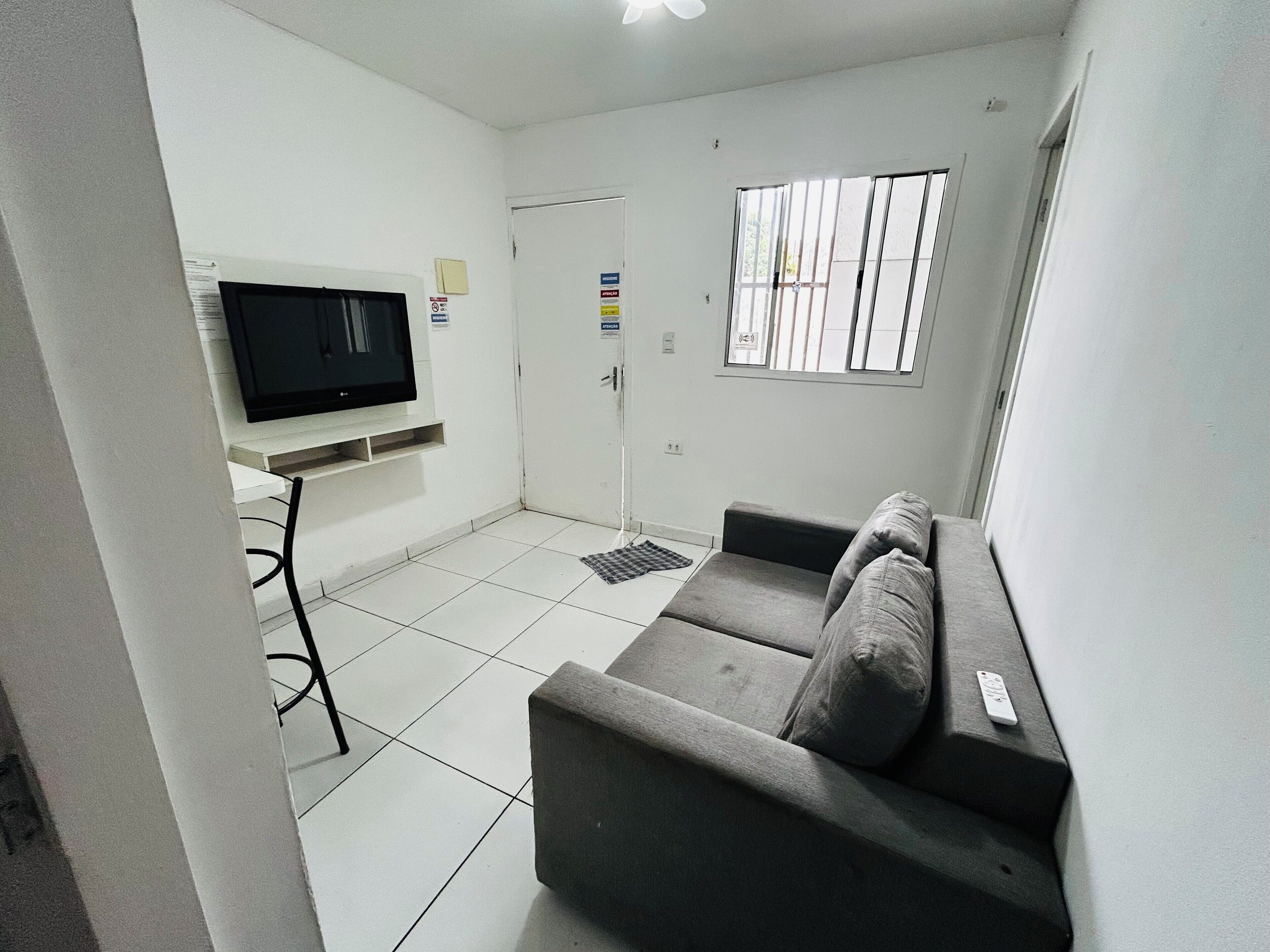 APARTAMENTO 01 - 01 DORMITÓRIO | リビング エリア | 液晶テレビ