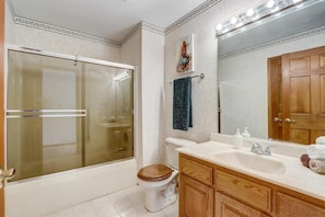 Shower, towels, soap, toilet paper