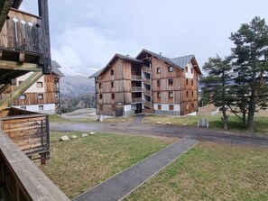 Stunning mountain views surround this traditional alpine-style hotel, offering a serene atmosphere.
