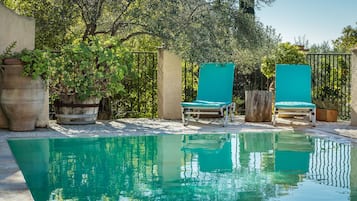 Outdoor pool, pool umbrellas, pool loungers