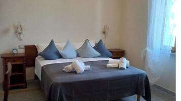 6 camere, ferro/asse da stiro, culla da viaggio, Wi-Fi gratuito