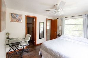 1 bedroom, desk, iron/ironing board, travel crib