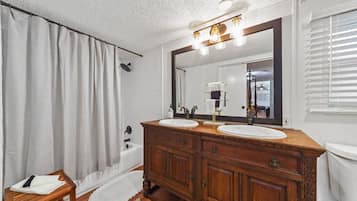 Shower, eco-friendly toiletries, hair dryer, towels