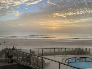 On the beach, sun-loungers, beach towels - Oceanfront Studio - “also can’t get closer to the beach” View, comfy and clean! (Ormond Beach)