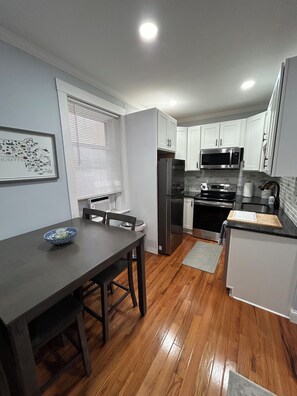 Fridge, microwave, oven, stovetop - Remodeled Spacious Apartment in Perfect Location (Boston)