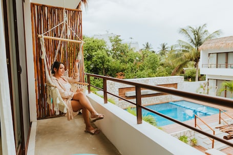 Deluxe Quadruple Room, 2 Double Beds, Private Bathroom | Terrace/patio