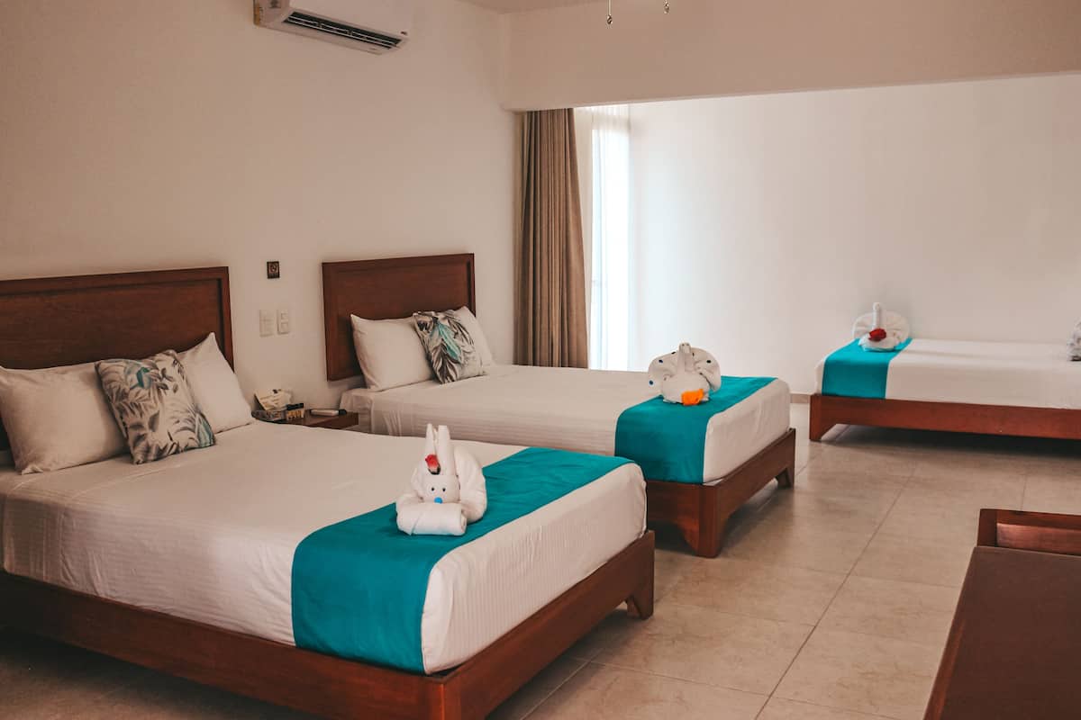Deluxe Studio Suite, Multiple Beds, Private Bathroom | In-room safe, desk, blackout drapes, iron/ironing board