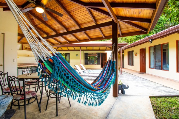 Patio area with covered-solar heated pool, bbq area.