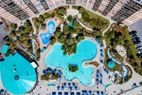 Beachfront Edgewater condo with lagoon pool, hot tubs, golf, and $300 of Free Activities Daily!