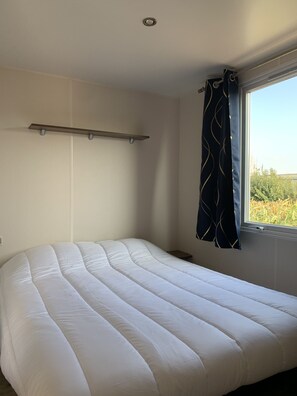 2 chambres, lit de bébé portatif, Wi-Fi (supplément), literie fournie