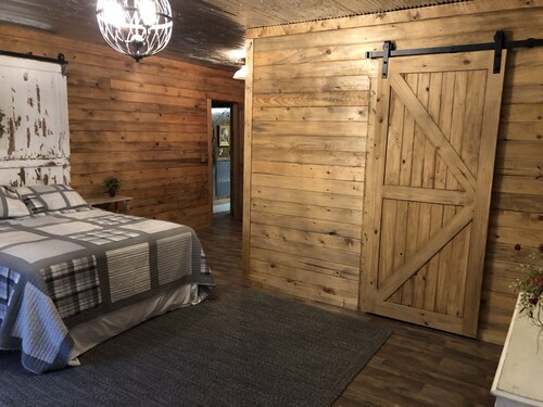 Lots of beds huge deck and a short walk to the lake. It’s time to be on the lake