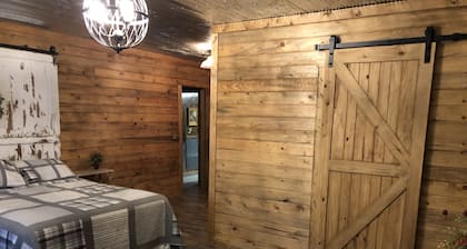 Lots of beds huge deck and a short walk to the lake. It’s time to be on the lake