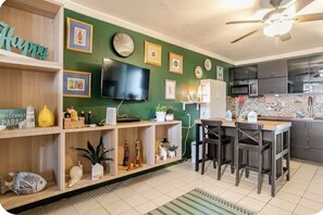 Fridge, microwave, stovetop, coffee/tea maker