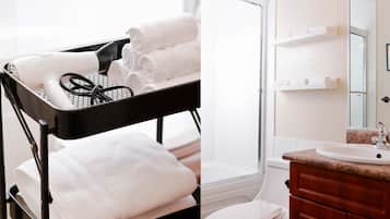 Combined shower/tub, hair dryer, towels, soap