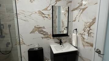 Hair dryer, towels, soap, shampoo