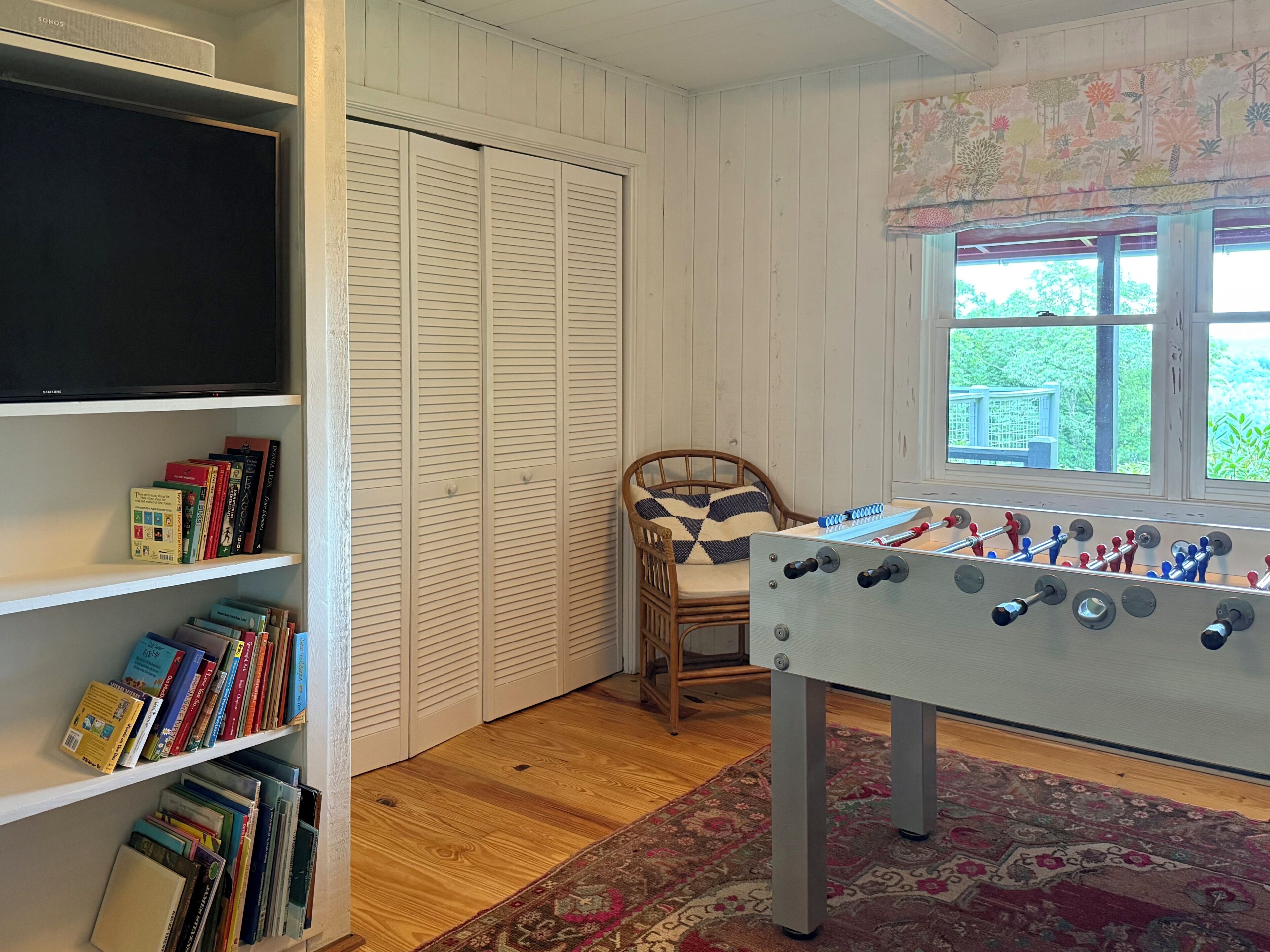 Foosball table, smart TV, and Sonos sound system