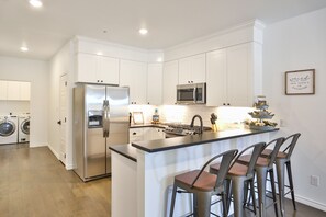 Fridge, microwave, oven, stovetop - Hill Country Haven a Modern/Rustic 2 Bedroom 2 Bath Townhouse off Main Street (Fredericksburg)