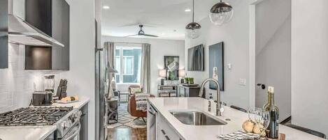 Fridge, coffee/tea maker, cookware/dishes/utensils