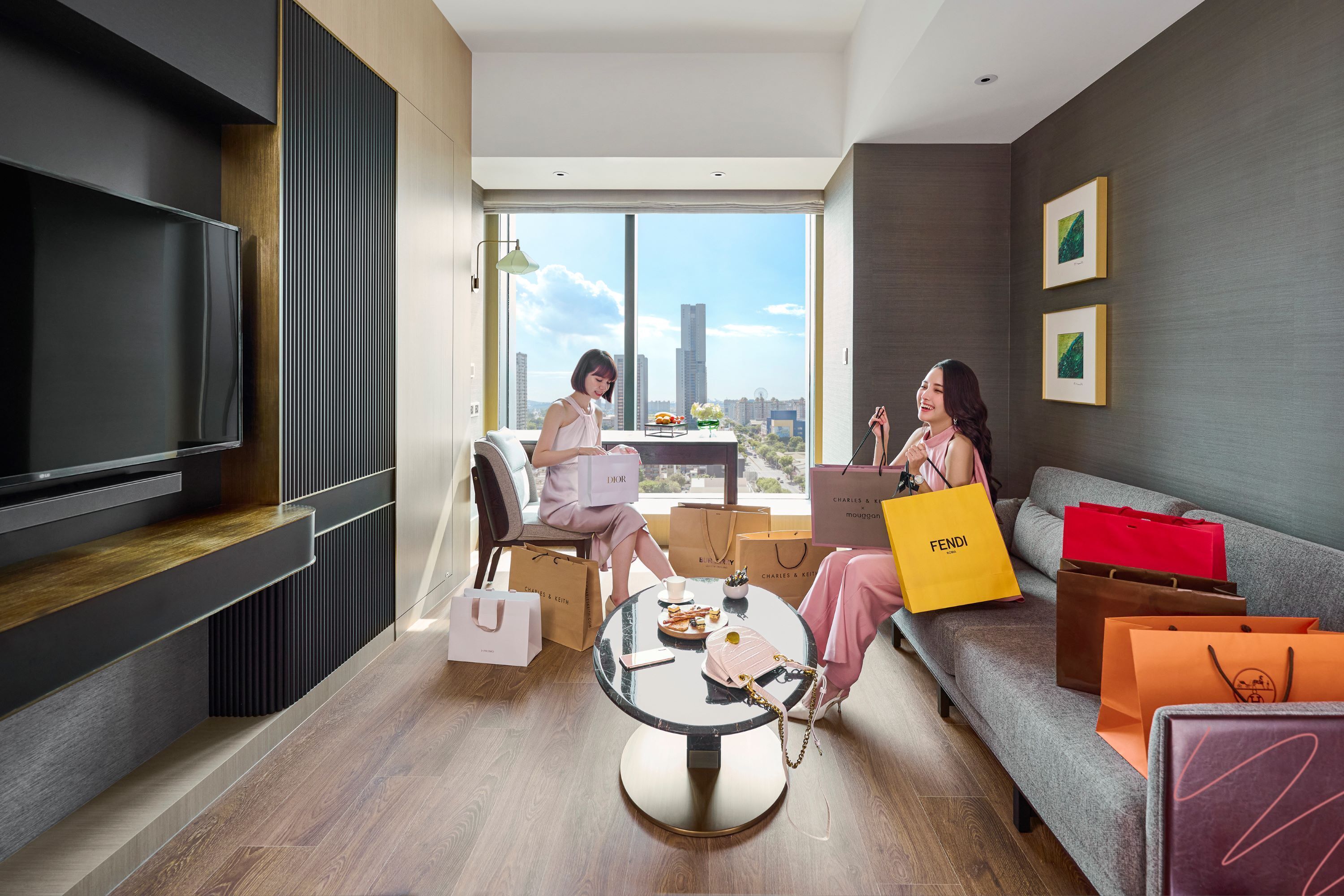 junior suite, 2 double beds | living area | 50-inch smart tv with cable channels, tv