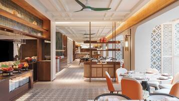 A modern restaurant interior with a central dining area, kitchen, and bar/lounge space.