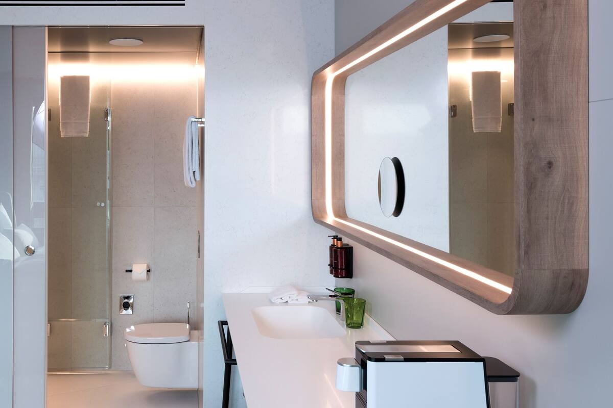 shower, rainfall showerhead, hair dryer, towels