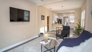 House (3 Bedrooms) | Living area | 50-inch TV with digital channels