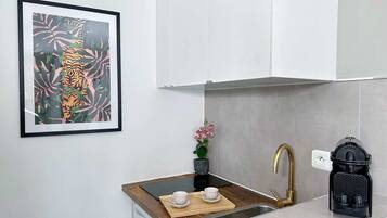 Fridge, microwave, stovetop, coffee/tea maker