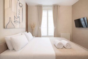 1 habitación, tabla de planchar con plancha, wifi y ropa de cama 